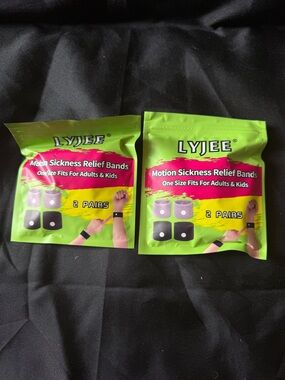 New 2 Packs of LYJEE Motion Sickness Relief Bands - 2 Pairs in Each Package